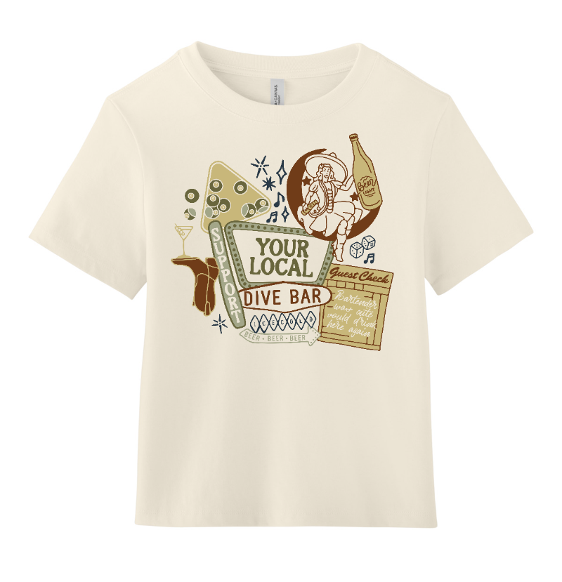 An off-white short-sleeve crewneck t-shirt featuring a vintage-style graphic print on the front with illustrations of a diving board, a conch shell, a bottle, and a sign that reads 'YOUR LOCAL DIVE BAR'.