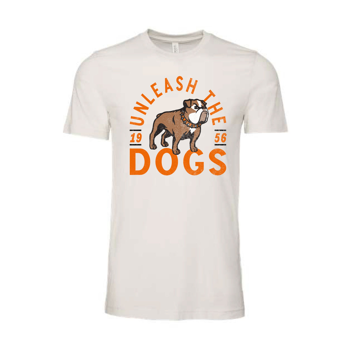 White graphic T-shirt displaying the words "unleash the dogs" and "1956 in orange lettering surrounding graphic of bulldog